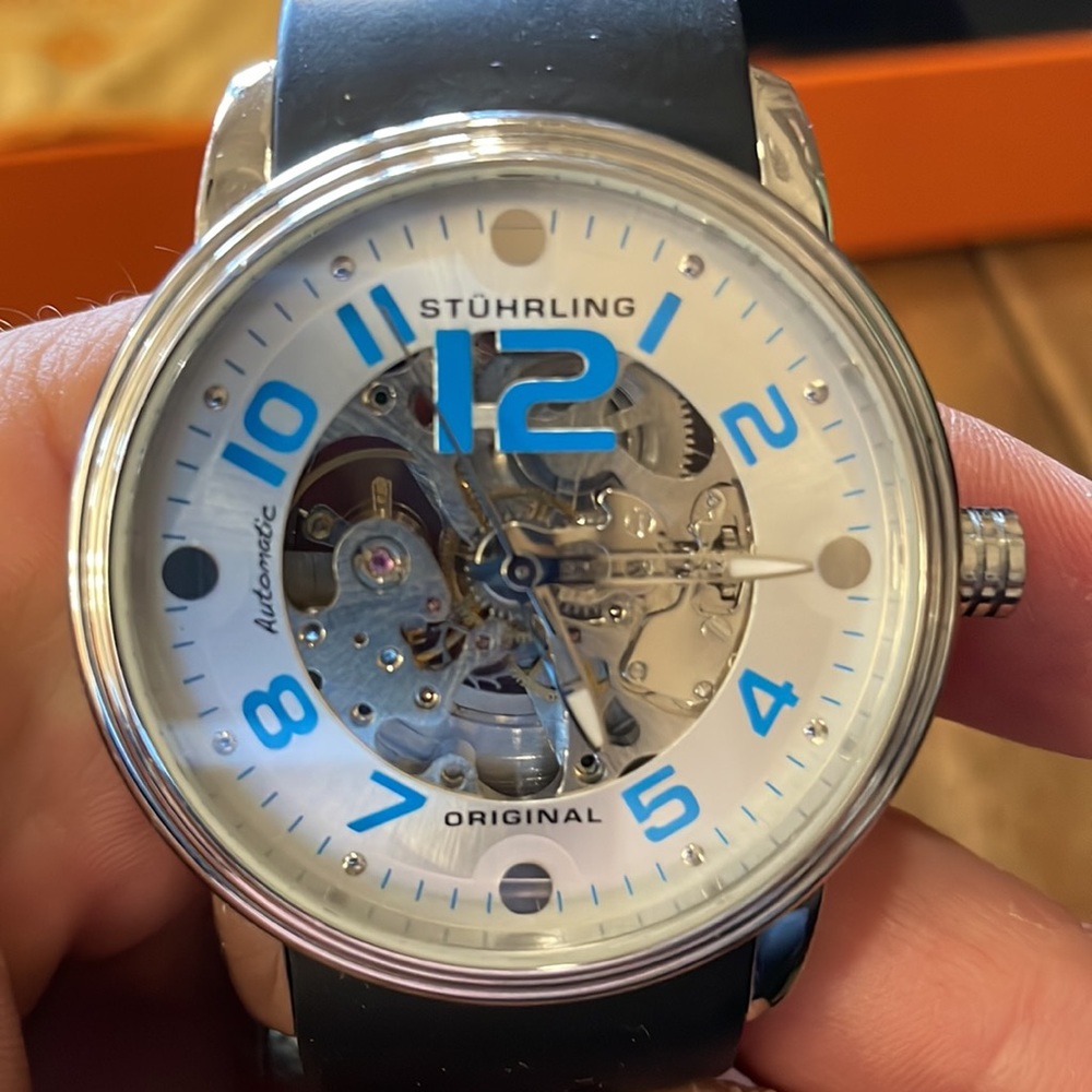 Stuhrling skeleton mechanical movement watch with automatic hand/wrist winding.